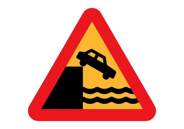 sign-car-falling-off-cliff